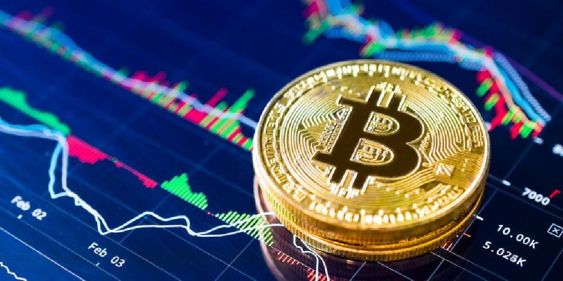 Bitcoin érmék egy árfolyam charton.